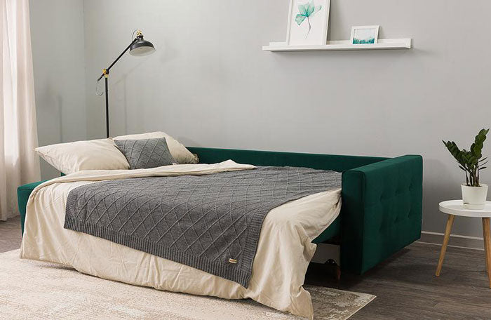 Amani Sofa Bed Unfolded in Green Fabric