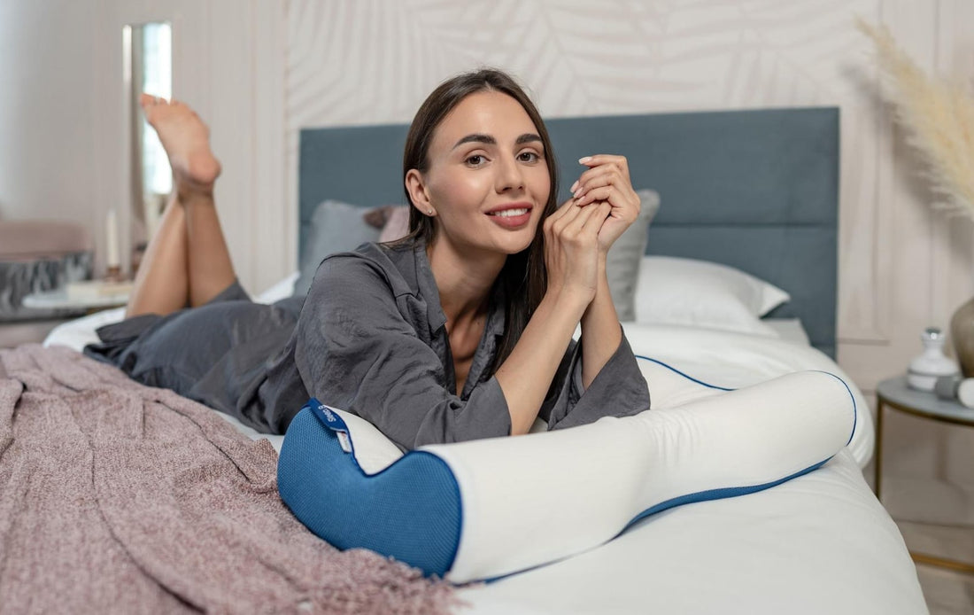 Woman laying on bed with Beauty pillow